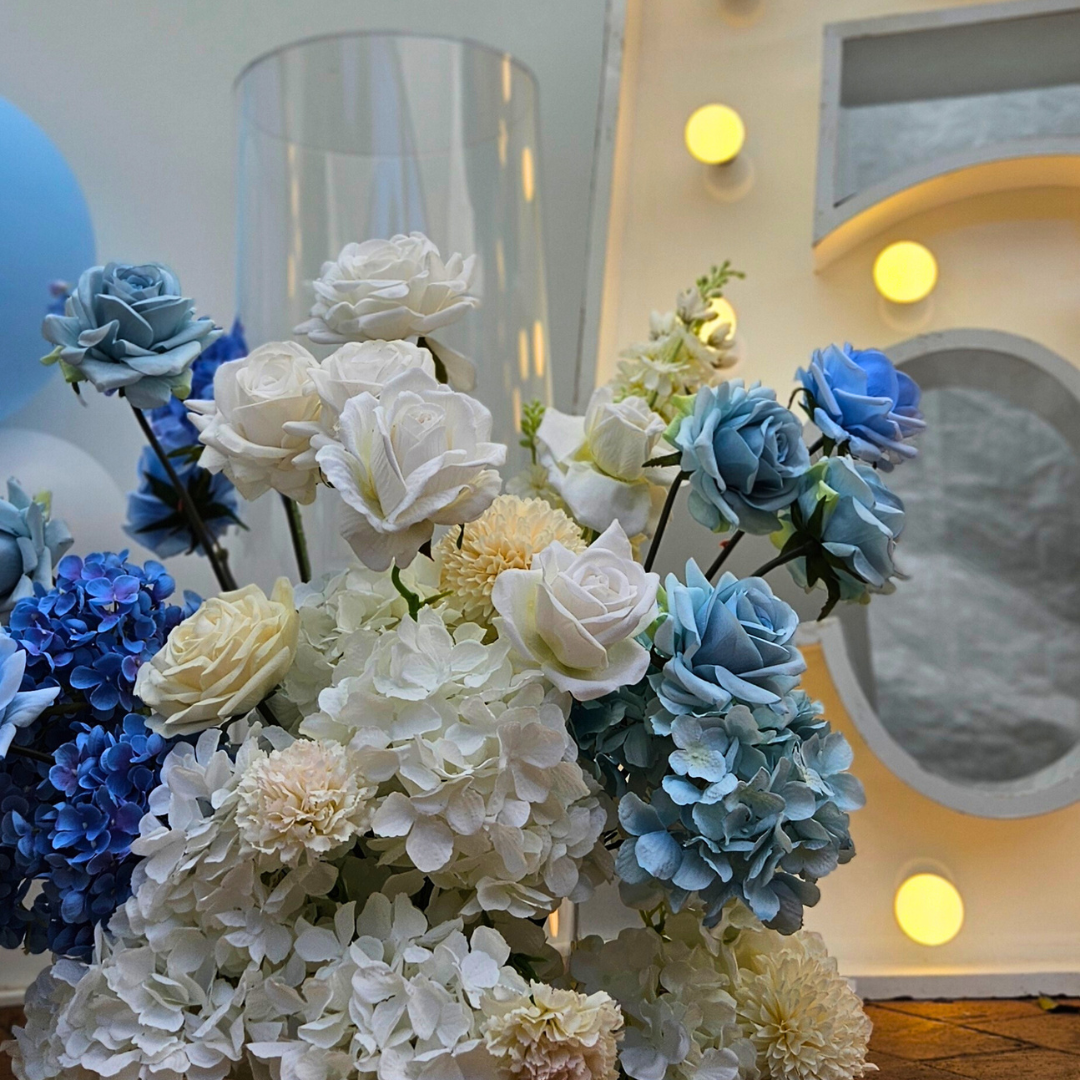 Blue and white balloon and floral backdrop for a 50th birthday. Large 50 LED numbers and a cake plinth. Prop hire, Prop hiring, Prop hire, event stylists Brisbane, brisbane event styling, brisbane event styling, event stylist Brisbane, Brisbane Wedding, Gold Coast Wedding, Floral Styling, Lush & Lavish Events, Brisbane Corporate Styling, Gold Coast Corporate Styling, Brisbane Brand Activation, Gold Coast Tablescapes, Brisbane Candle Hire