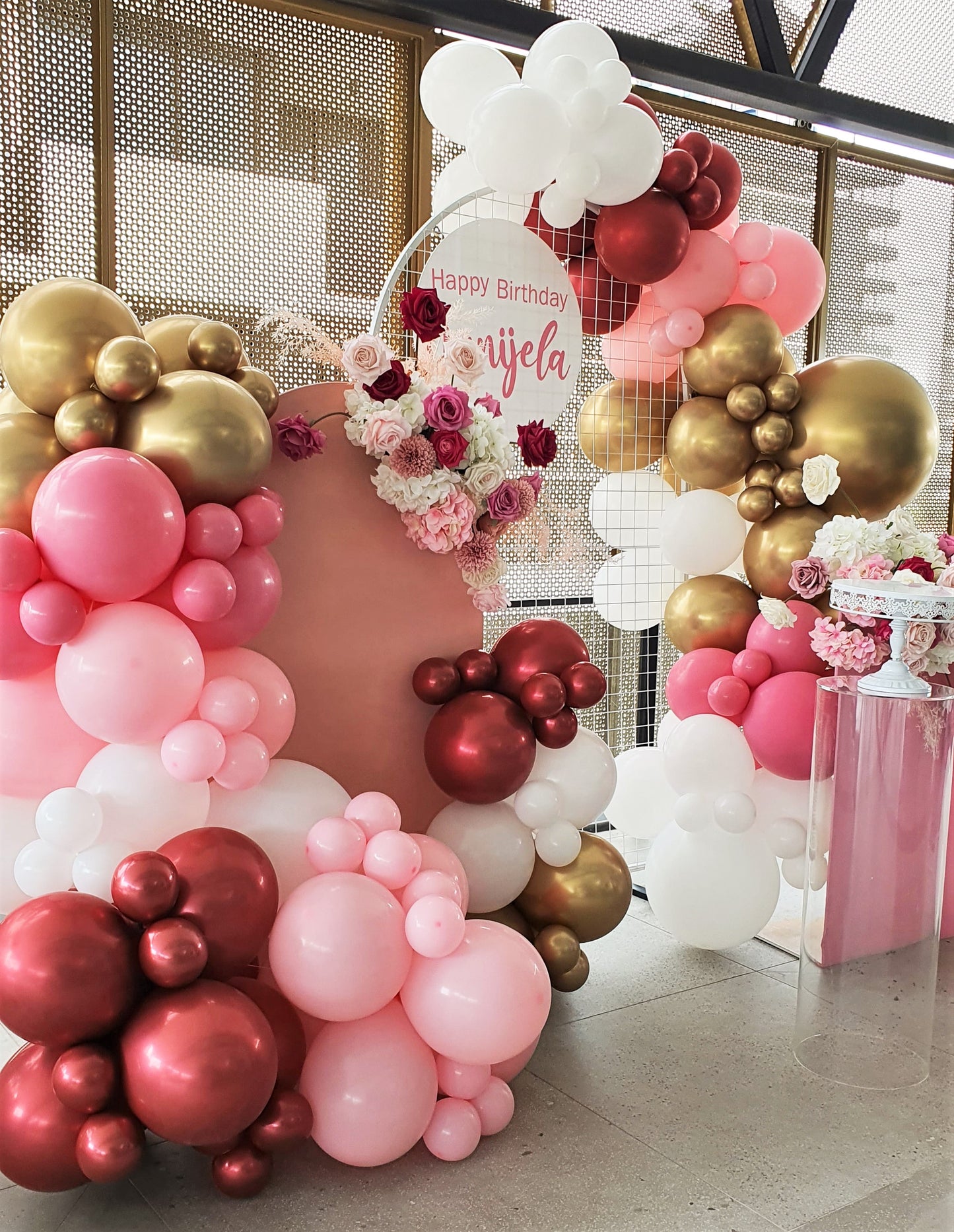 Gorgeous birthday party backdrop with pink, white, and gold balloons and floral arrangements, featuring a sign that says "Happy Birthday Danijela." Prop hire, Prop hiring, Prop hire, event stylists Brisbane, brisbane event styling, brisbane event styling, event stylist Brisbane, Brisbane Wedding, Gold Coast Wedding, Floral Styling, Lush & Lavish Events, Brisbane Tablescape, Gold Coast Tablescapes, Brisbane Candle Hire