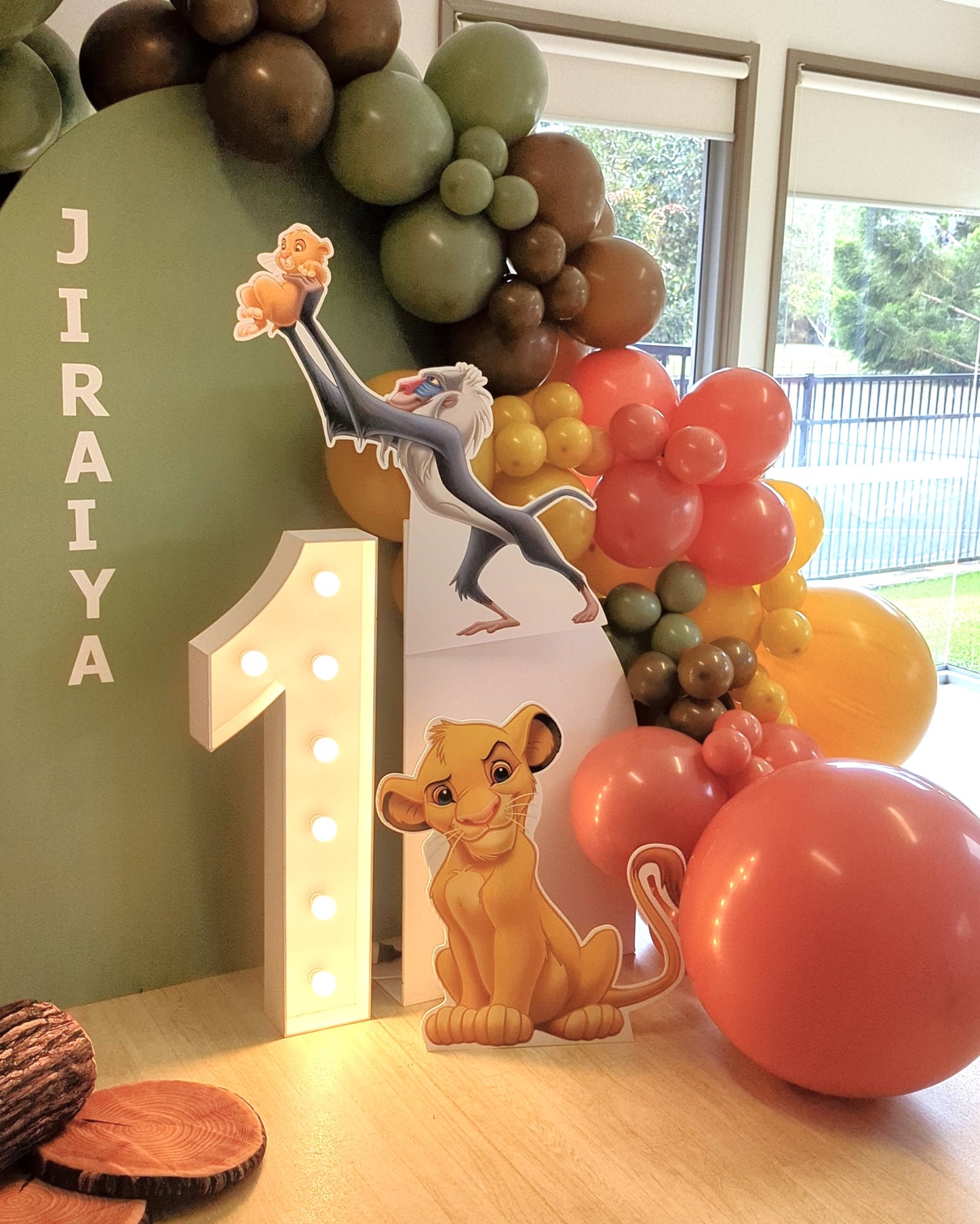 Lion King party setup with Simba, Nala, and Timon cutouts, and a colorful balloon arch. Prop hire, Prop hiring, Prop hire, event stylists Brisbane, brisbane event styling, brisbane event styling, event stylist Brisbane, Brisbane Wedding, Gold Coast Wedding, Floral Styling, Lush & Lavish Events, Brisbane Tablescape, Gold Coast Tablescapes, Brisbane Candle Hire