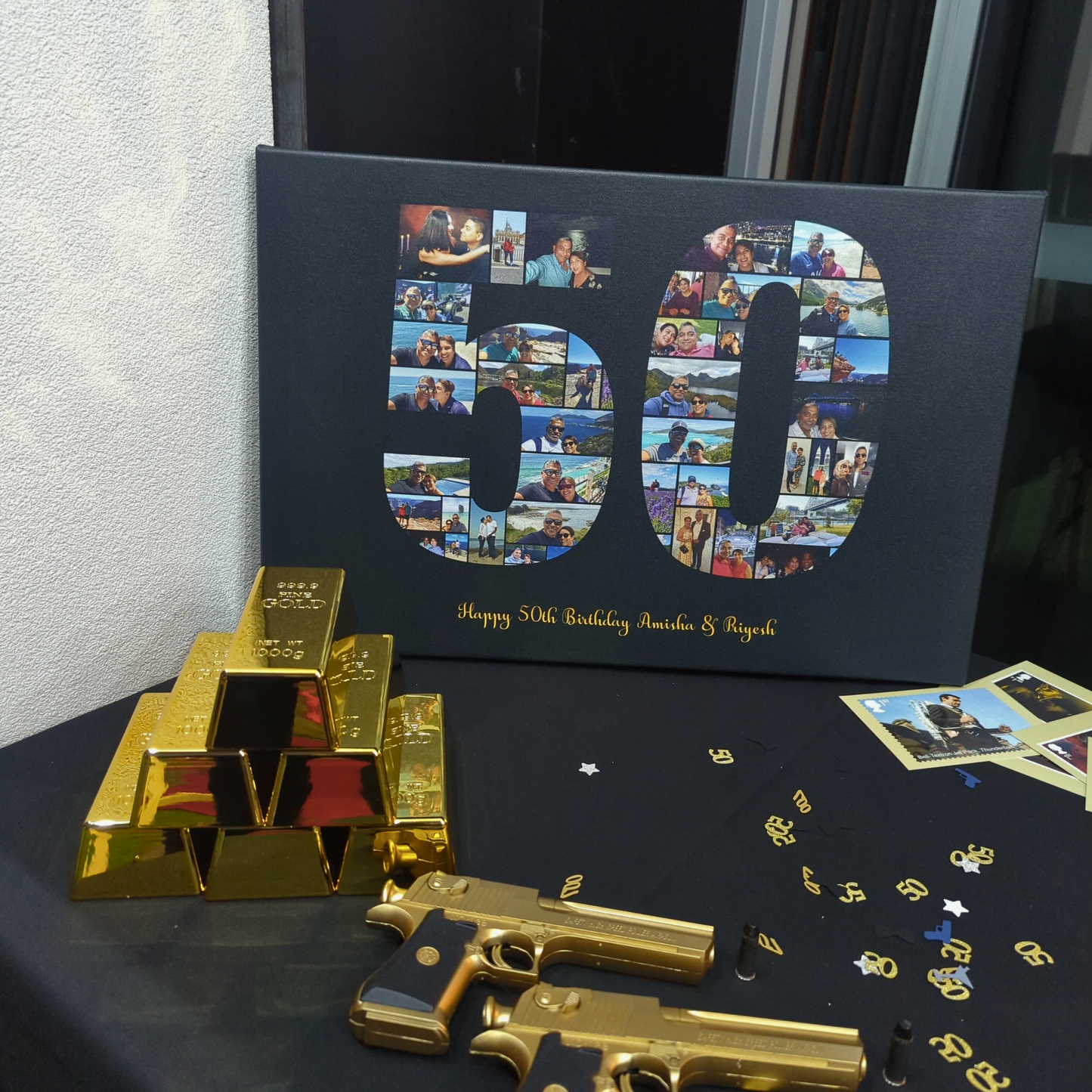 Display with '50' made of small photos, 'Happy 50th Birthday Amishemea & Priyesh' text, gold bar replicas, gold replica guns, and scattered gold items and photos. Prop hire, Prop hiring, Prop hire, event stylists Brisbane, brisbane event styling, brisbane event styling, event stylist Brisbane, Brisbane Wedding, Gold Coast Wedding, Floral Styling, Lush & Lavish Events, Brisbane Tablescape, Gold Coast Tablescapes, Brisbane Candle Hire