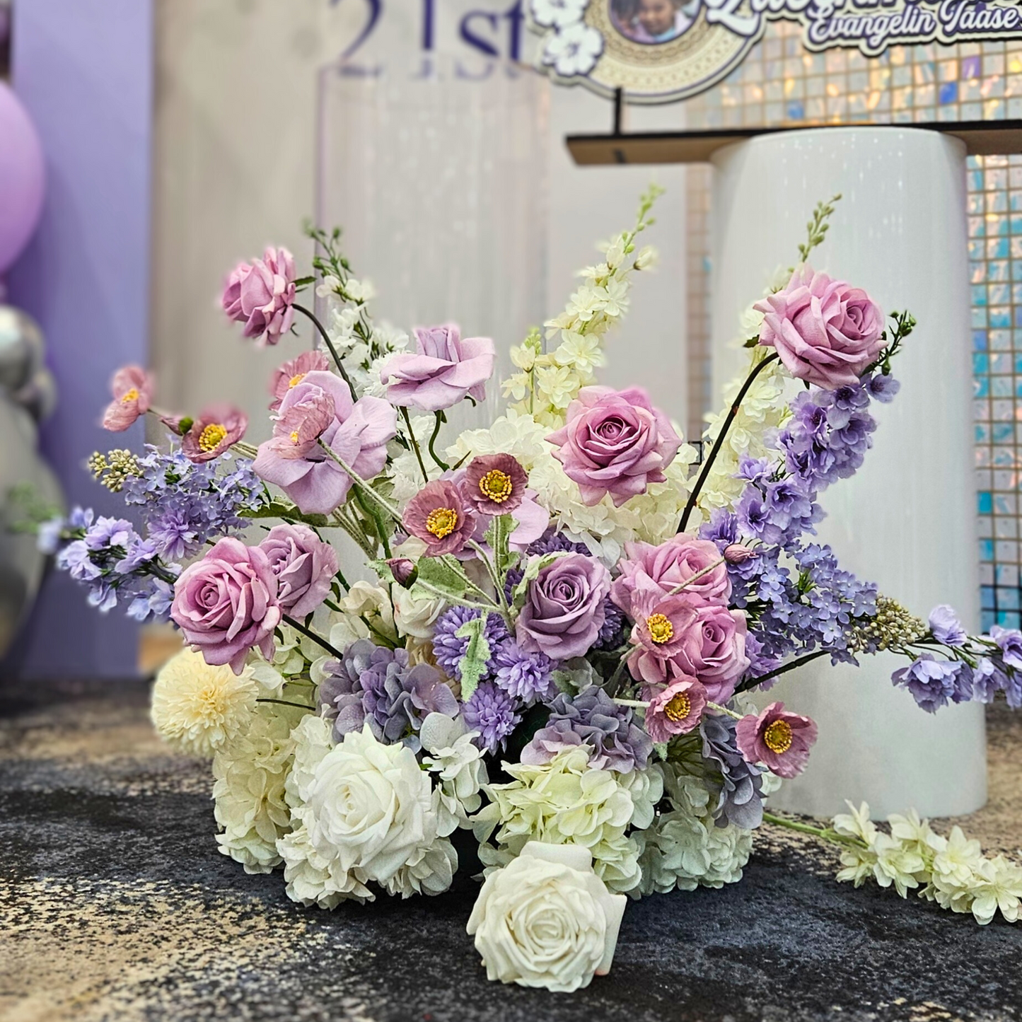 Purple and silver themed backdrop with shimmer wall. Large balloon installation with 3 floral arrangements. Prop hire, Prop hiring, Prop hire, event stylists Brisbane, brisbane event styling, brisbane event styling, event stylist Brisbane, Brisbane Wedding, Gold Coast Wedding, Floral Styling, Lush & Lavish Events, Brisbane Corporate Styling, Gold Coast Corporate Styling, Brisbane Brand Activation