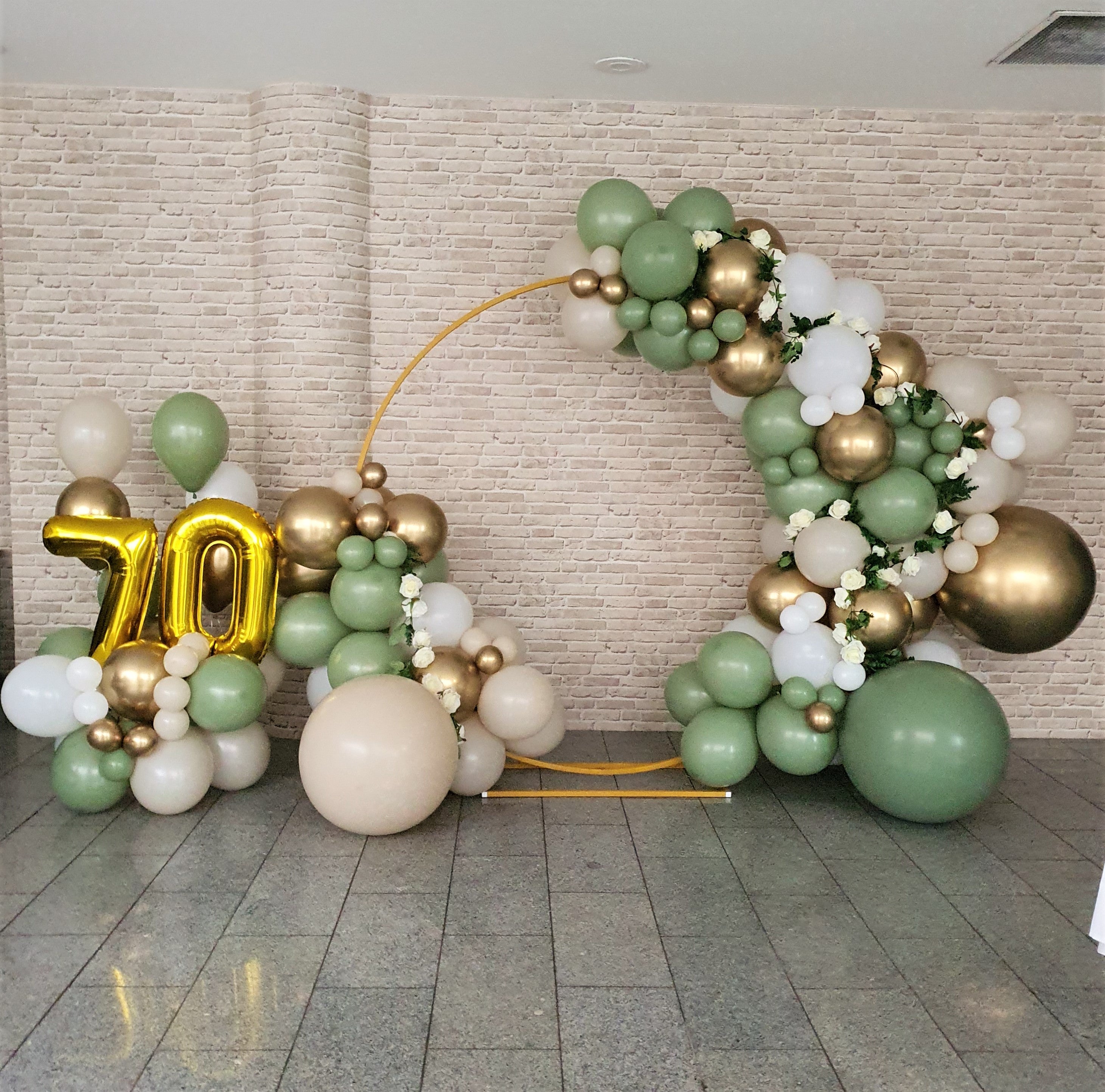 Gold '70' balloon with green, white, and gold balloons on a brick wall. Prop hire, Prop hiring, Prop hire, event stylists Brisbane, brisbane event styling, brisbane event styling, event stylist Brisbane, Brisbane Wedding, Gold Coast Wedding, Floral Styling, Lush & Lavish Events, Brisbane Corporate Styling, Gold Coast Corporate Styling, Brisbane Brand Activation