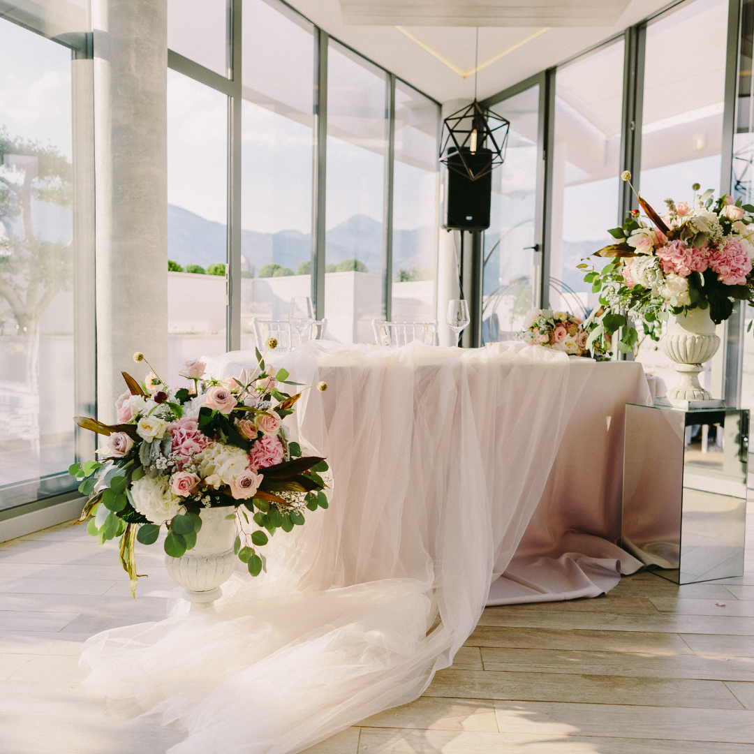 Wedding table with white tablecloth, pink and white floral arrangements, set in a bright venue with mountain views. Prop hire, Prop hiring, Prop hire, event stylists Brisbane, brisbane event styling, brisbane event styling, event stylist Brisbane, Brisbane Wedding, Gold Coast Wedding, Floral Styling, Lush & Lavish Events, Brisbane Tablescape, Gold Coast Tablescapes, Brisbane Candle Hire