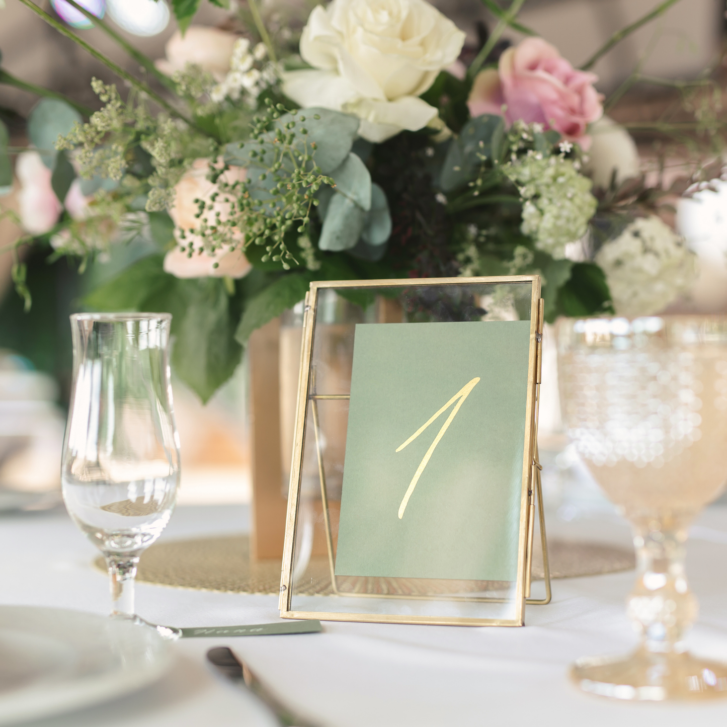 Table setting with floral centerpiece and table number card in a gold frame. Prop hire, Prop hiring, Prop hire, event stylists Brisbane, brisbane event styling, brisbane event styling, event stylist Brisbane, Brisbane Wedding, Gold Coast Wedding, Floral Styling, Lush & Lavish Events, Brisbane Tablescape, Gold Coast Tablescapes, Brisbane Candle Hire