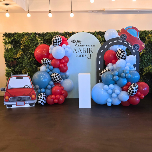 Luxe balloon backdrop with checkered print foil balloons and 2 car cutouts. Prop hire, Prop hiring, Prop hire, event stylists Brisbane, brisbane event styling, brisbane event styling, event stylist Brisbane, Brisbane Wedding, Gold Coast Wedding, Floral Styling, Lush & Lavish Events, Brisbane Corporate Styling, Gold Coast Corporate Styling, Brisbane Brand Activation