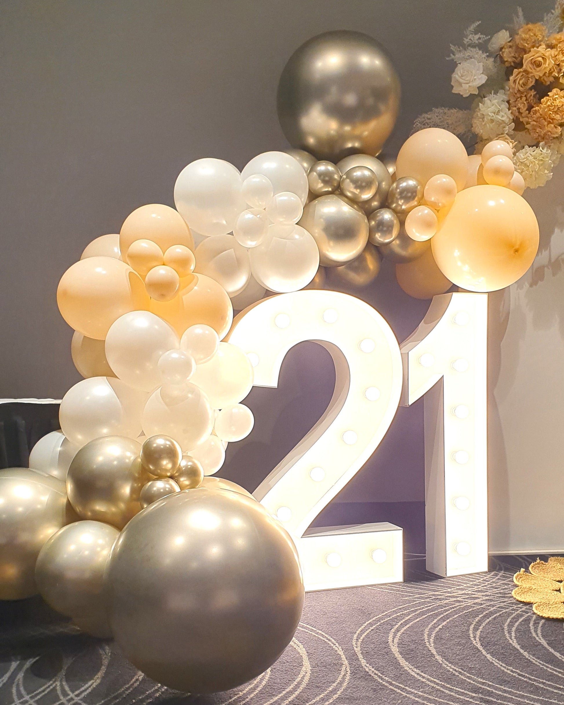 Illuminated '21' sign with gold, white, and beige balloon arch. Prop hire, Prop hiring, Prop hire, event stylists Brisbane, brisbane event styling, brisbane event styling, event stylist Brisbane, Brisbane Wedding, Gold Coast Wedding, Floral Styling, Lush & Lavish Events, Brisbane Tablescape, Gold Coast Tablescapes, Brisbane Candle Hire