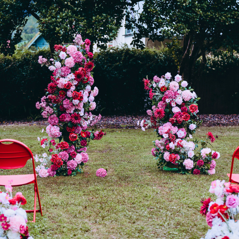 Red Pink floral pillars, custom welcome sign, tulle cake cutting plinth with floral arrangement and table decor. Prop hire, Prop hiring, Prop hire, event stylists Brisbane, brisbane event styling, brisbane event styling, event stylist Brisbane, Brisbane Wedding, Gold Coast Wedding, Floral Styling, Lush & Lavish Events, Brisbane Corporate Styling, Gold Coast Corporate Styling, Brisbane Brand Activation, Gold Coast Tablescapes, Brisbane Candle Hire