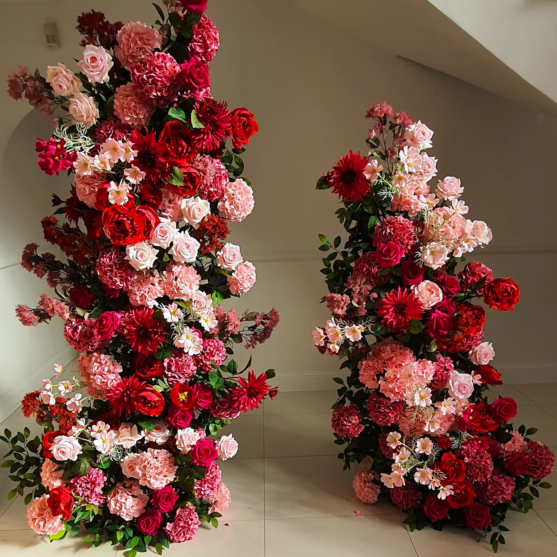 Red Pink floral pillars, custom welcome sign, tulle cake cutting plinth with floral arrangement and table decor. Prop hire, Prop hiring, Prop hire, event stylists Brisbane, brisbane event styling, brisbane event styling, event stylist Brisbane, Brisbane Wedding, Gold Coast Wedding, Floral Styling, Lush & Lavish Events, Brisbane Corporate Styling, Gold Coast Corporate Styling, Brisbane Brand Activation, Gold Coast Tablescapes, Brisbane Candle Hire
