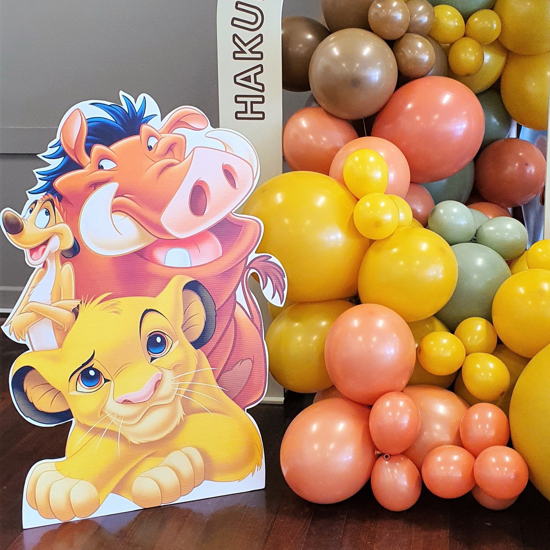 Simba, Timon, and Pumbaa cutout with colorful balloons. Prop hire, Prop hiring, Prop hire, event stylists Brisbane, brisbane event styling, brisbane event styling, event stylist Brisbane, Brisbane Wedding, Gold Coast Wedding, Floral Styling, Lush & Lavish Events, Brisbane Tablescape, Gold Coast Tablescapes, Brisbane Candle Hire