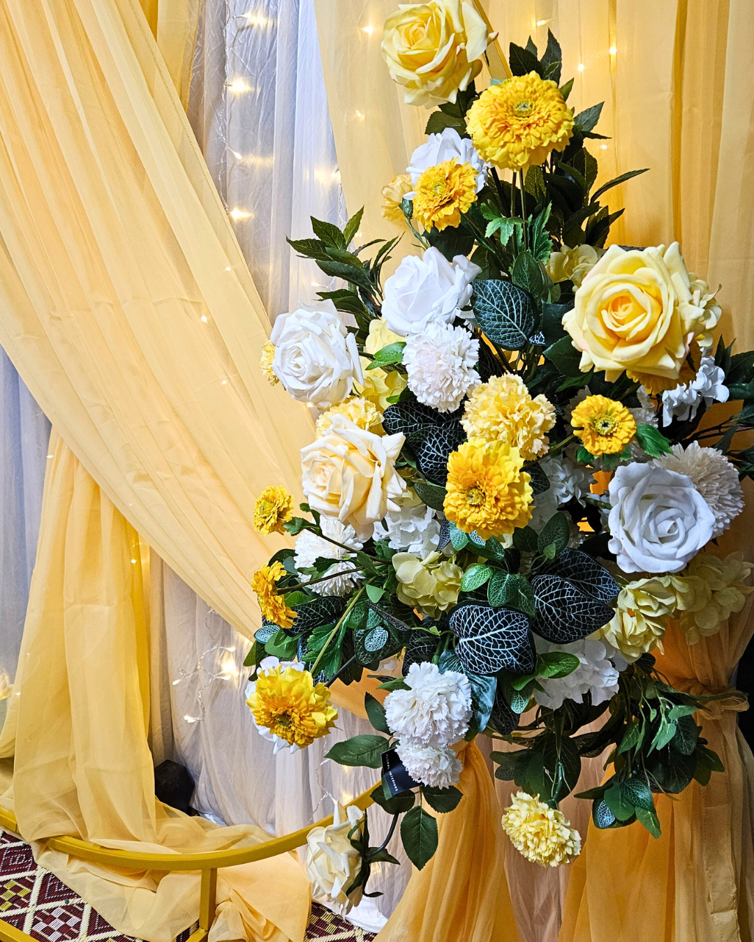 Yellow draped curtain backdrop with floral arrangements. Prop hire, Prop hiring, Prop hire, event stylists Brisbane, brisbane event styling, brisbane event styling, event stylist Brisbane, Brisbane Wedding, Gold Coast Wedding, Floral Styling, Lush & Lavish Events, Brisbane Corporate Styling, Gold Coast Corporate Styling, Brisbane Brand Activation, Gold Coast Tablescapes, Brisbane Candle Hire