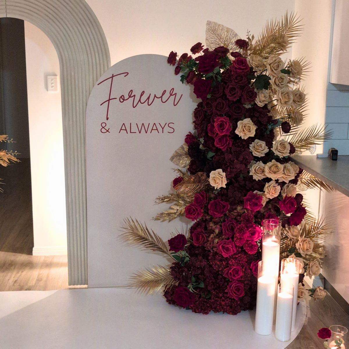 Romantic proposal backdrop with candles, elegant floral styling and a luxury setup designed for marriage proposals. A beautiful surprise proposal decoration for men planning a memorable proposal for their girlfriend, creating an intimate and romantic engagement moment in Brisbane, Gold Coast and South East Queensland.