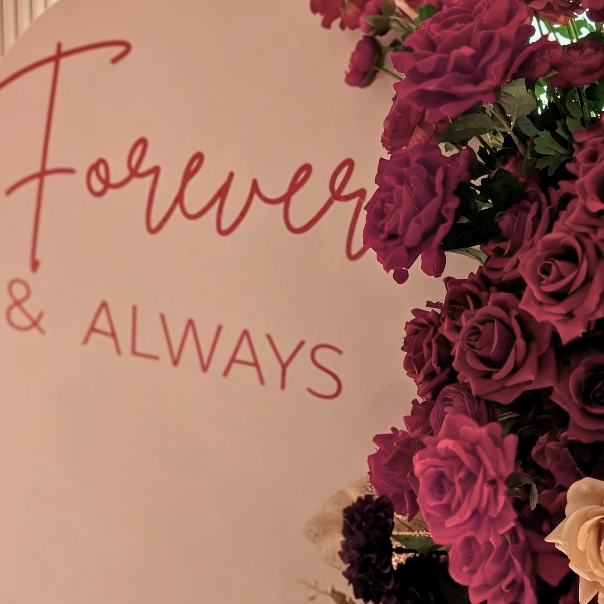 Romantic proposal backdrop with candles, elegant floral styling and a luxury setup designed for marriage proposals. A beautiful surprise proposal decoration for men planning a memorable proposal for their girlfriend, creating an intimate and romantic engagement moment in Brisbane, Gold Coast and South East Queensland.