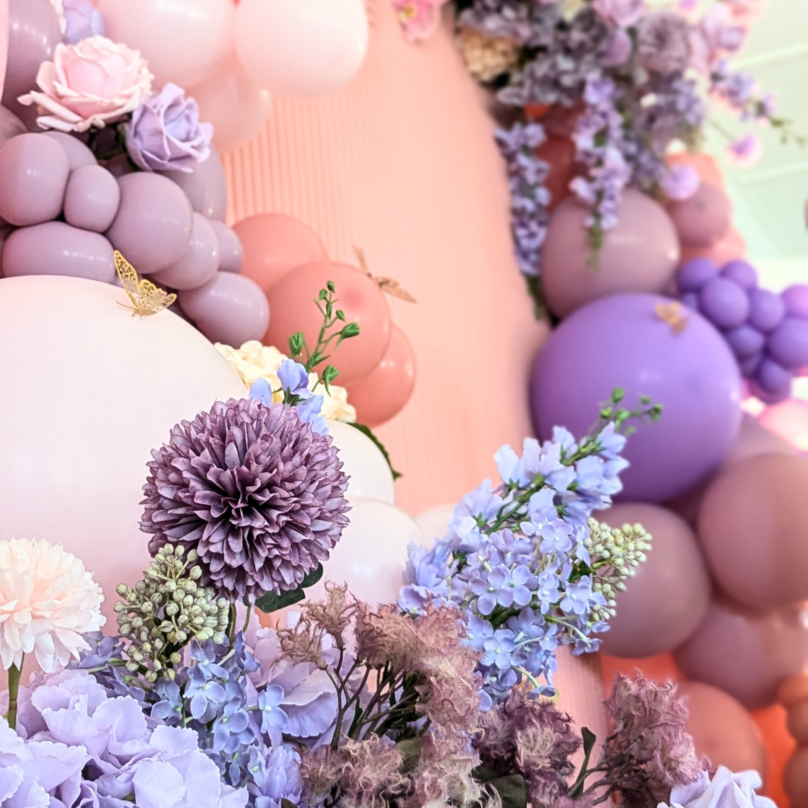 Floral and balloon backdrop in pinks and purples with gold butterfly's and a larger white butterfly. Prop hire, Prop hiring, Prop hire, event stylists Brisbane, brisbane event styling, brisbane event styling, event stylist Brisbane, Brisbane Wedding, Gold Coast Wedding, Floral Styling, Lush & Lavish Events, Brisbane Corporate Styling, Gold Coast Corporate Styling, Brisbane Brand Activation, Gold Coast Tablescapes, Brisbane Candle Hire