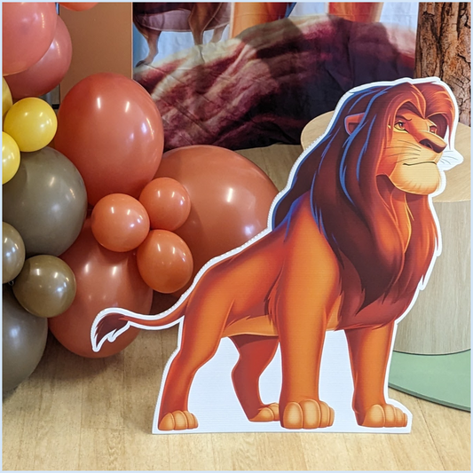Adult Simba cutout from The Lion King with colorful balloons in the background. Prop hire, Prop hiring, Prop hire, event stylists Brisbane, brisbane event styling, brisbane event styling, event stylist Brisbane, Brisbane Wedding, Gold Coast Wedding, Floral Styling, Lush & Lavish Events, Brisbane Tablescape, Gold Coast Tablescapes, Brisbane Candle Hire
