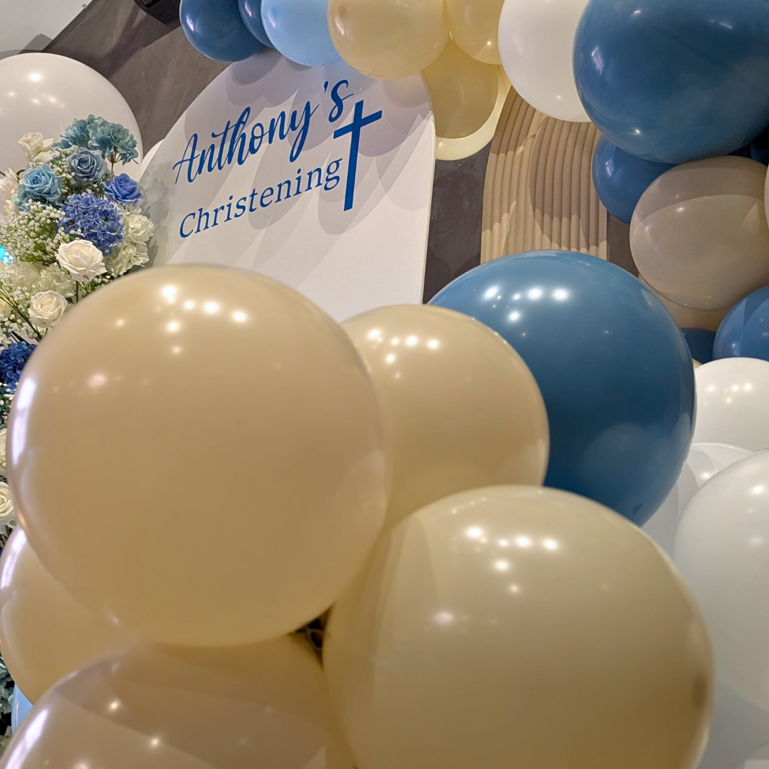 blue white floral and balloon backdrop woth wording "Anthony's Christening" . PErsonalised menus with guest name on, baby breath bud vases and white floral domes. Personalised custom seating chart and floral arrangement. Prop hire, Prop hiring, Prop hire, event stylists Brisbane, brisbane event styling, brisbane event styling, event stylist Brisbane, Brisbane Wedding, Gold Coast Wedding, Floral Styling, Lush & Lavish Events, Brisbane Corporate Styling, Gold Coast Tablescapes, Brisbane Candle Hire