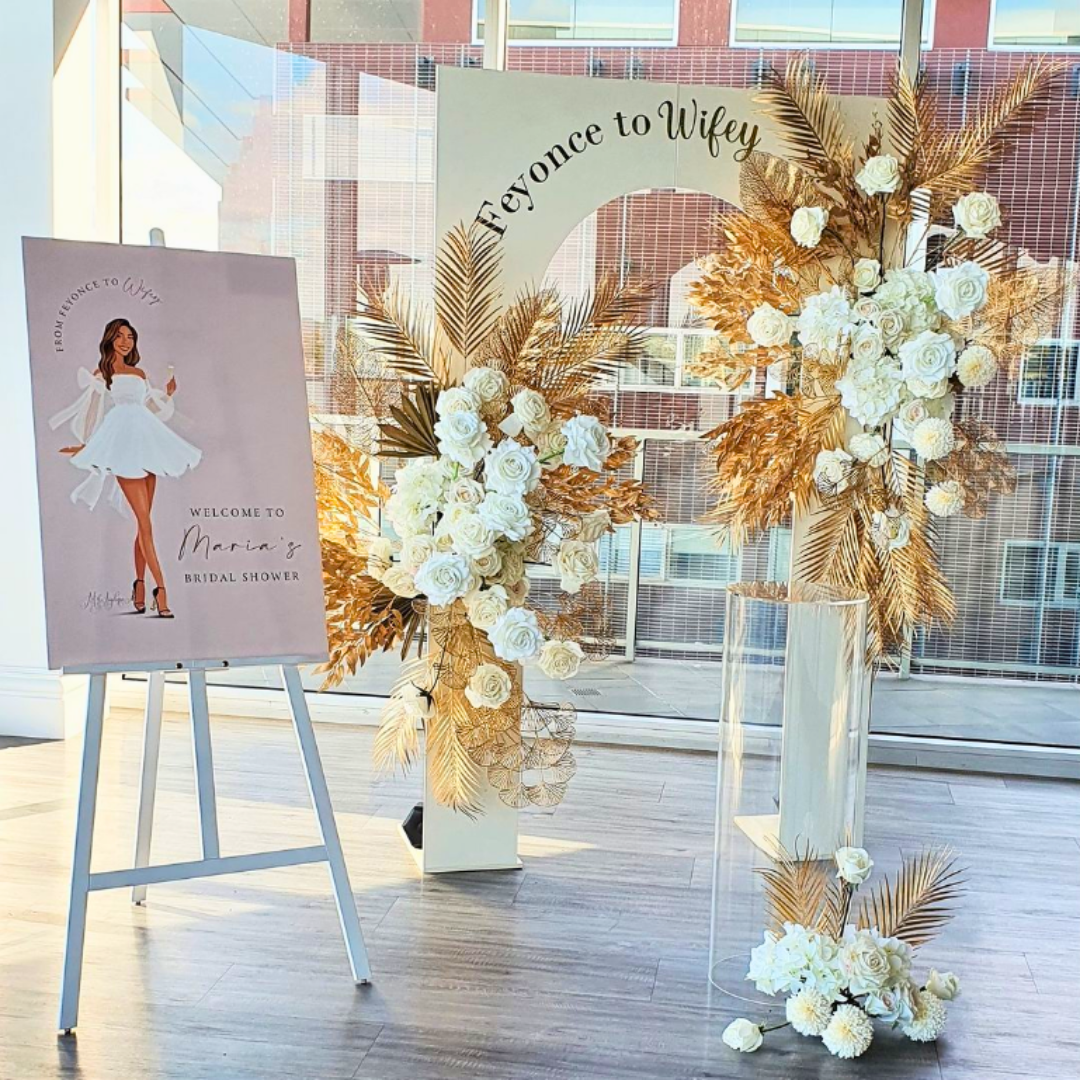 Bridal shower setup with a ring-shaped floral arrangement, welcome sign, and a circular ‘From Miss to Mrs’ sign in an indoor setting with natural light. Prop hire, Prop hiring, Prop hire, event stylists Brisbane, brisbane event styling, brisbane event styling, event stylist Brisbane, Brisbane Wedding, Gold Coast Wedding, Floral Styling, Lush & Lavish Events, Brisbane Tablescape, Gold Coast Tablescapes, Brisbane Candle Hire
