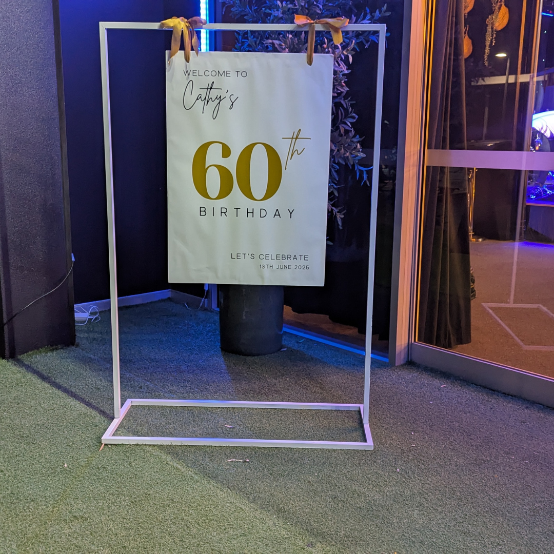 Decorative sign for Cathy's 60th birthday with a white frame.  Prop hire, Prop hiring, Prop hire, event stylists Brisbane, brisbane event styling, brisbane event styling, event stylist Brisbane, Brisbane Wedding, Gold Coast Wedding, Floral Styling, Lush & Lavish Events, Brisbane Corporate Styling, Gold Coast Corporate Styling, Brisbane Brand Activation, Gold Coast Tablescapes, Brisbane Candle Hire