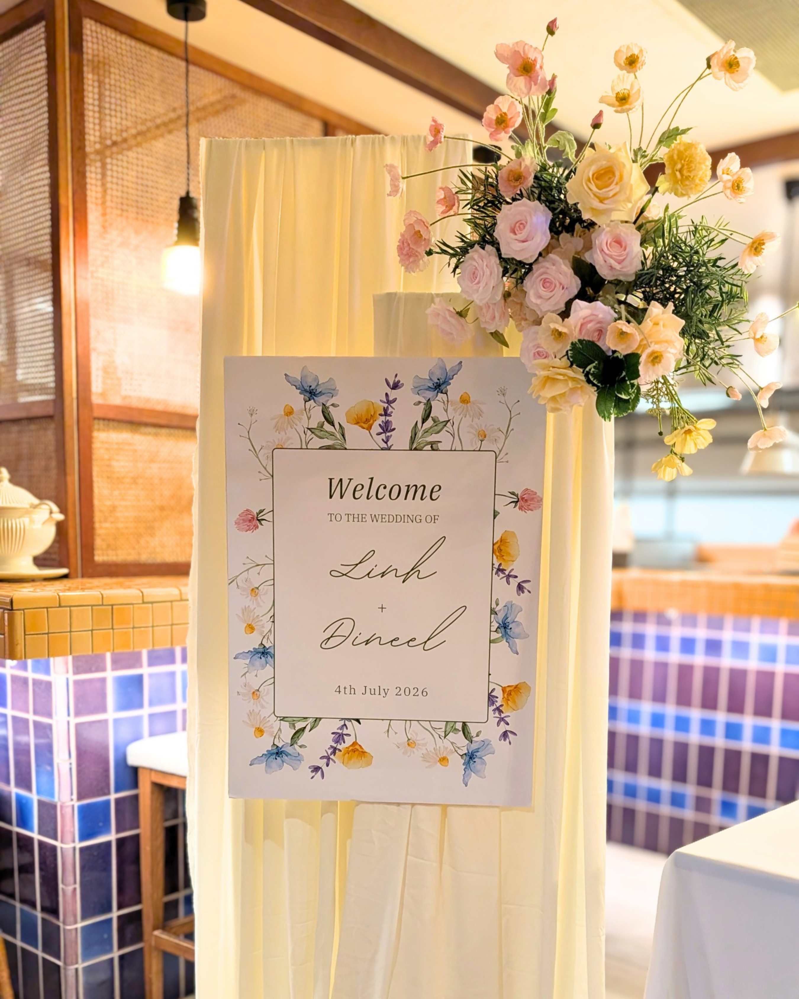 Luxury draped welcome sign hire featuring two elegant fabric-draped frames, a personalised welcome poster and a fresh floral arrangement, perfect for wedding receptions, engagement parties, baby showers, bridal showers and luxury event styling in Brisbane, Gold Coast and South East Queensland.