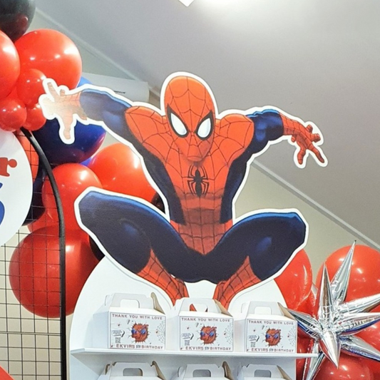 A dynamic Spiderman cutout, perfect for superhero-themed parties, is available for hire. The cutout is displayed against a backdrop of red and blue balloons, creating a vibrant and exciting scene. Prop hire, Prop hiring, Prop hire, event stylists Brisbane, brisbane event styling, brisbane event styling, event stylist Brisbane, Brisbane Wedding, Gold Coast Wedding, Floral Styling, Lush & Lavish Events, Brisbane Tablescape, Gold Coast Tablescapes, Brisbane Candle Hire