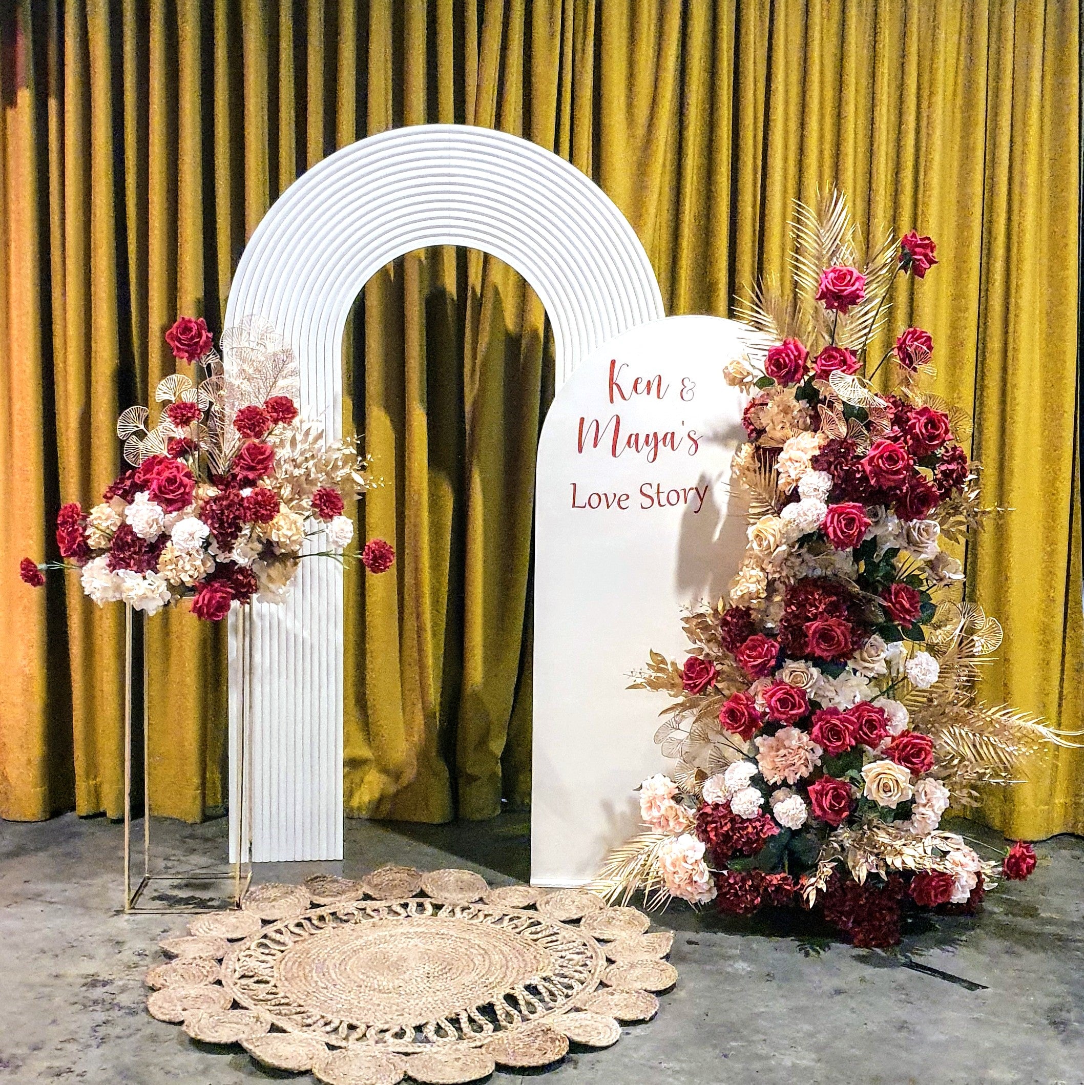 Floral backdrop in red, cream and gold. Signage says "Ken & Maya's Love Story". Balloon backdrop in white, green and gold, with green leaves immersed in the balloons. 5 safari animals and signage saying Wild Two. Prop hire, Prop hiring, Prop hire, event stylists Brisbane, brisbane event styling, brisbane event styling, event stylist Brisbane, Brisbane Wedding, Gold Coast Wedding, Floral Styling, Lush & Lavish Events, Brisbane Corporate Styling, Gold Coast Corporate Styling, Brisbane Brand Activation