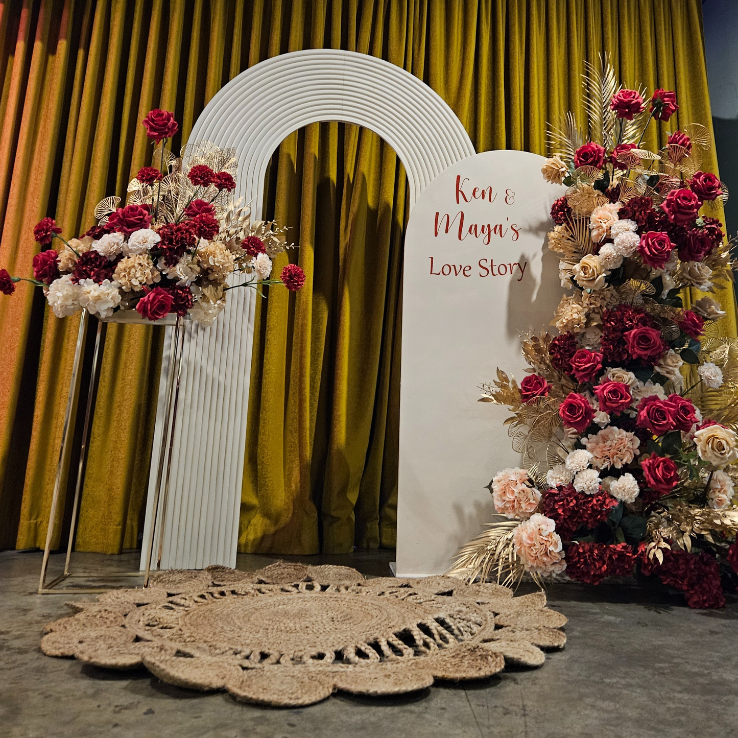 Floral backdrop in red, cream and gold. Signage says "Ken & Maya's Love Story". Balloon backdrop in white, green and gold, with green leaves immersed in the balloons. 5 safari animals and signage saying Wild Two. Prop hire, Prop hiring, Prop hire, event stylists Brisbane, brisbane event styling, brisbane event styling, event stylist Brisbane, Brisbane Wedding, Gold Coast Wedding, Floral Styling, Lush & Lavish Events, Brisbane Corporate Styling, Gold Coast Corporate Styling, Brisbane Brand Activation