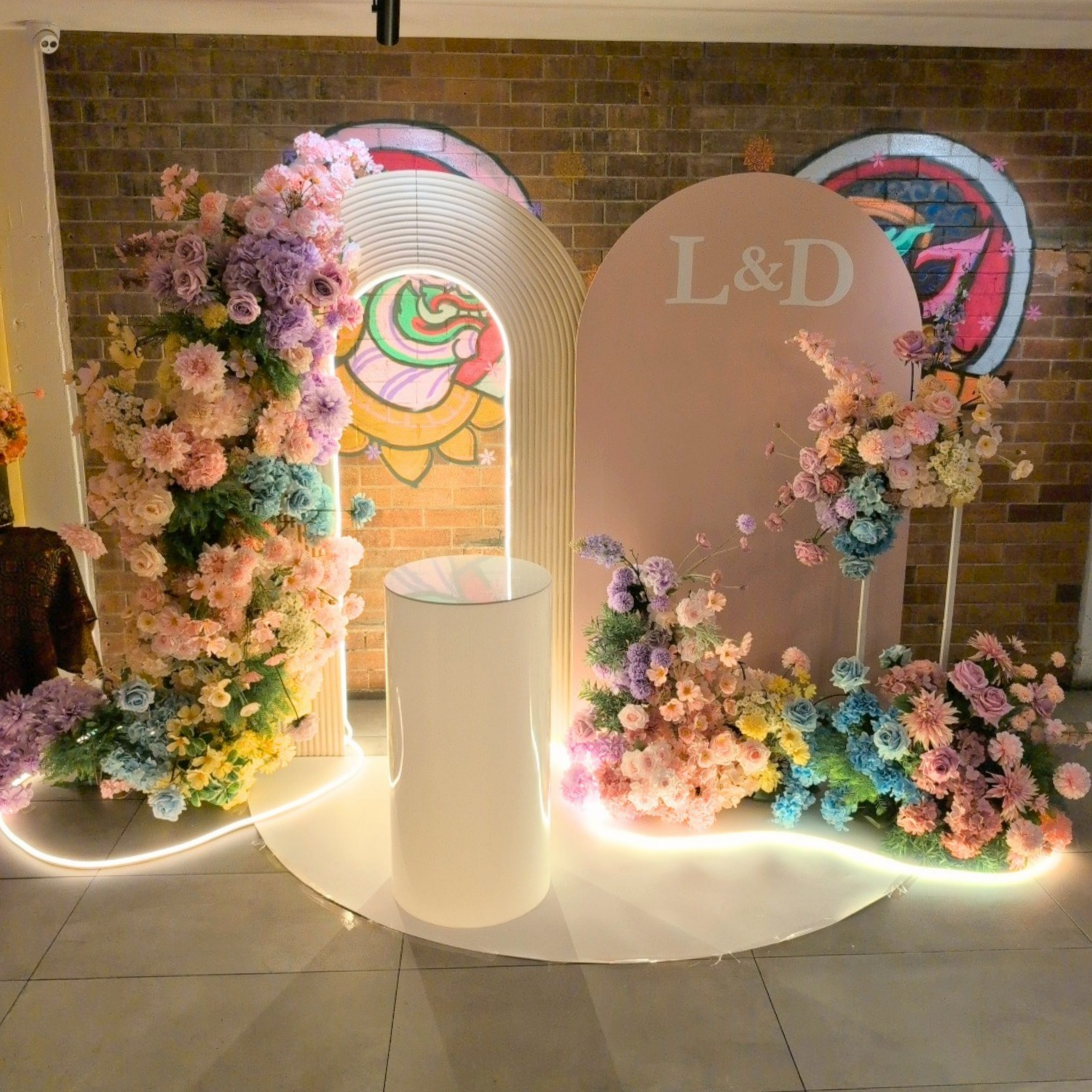 Bespoke wedding styling by Lush & Lavish Events for Linh and Dineel’s Brisbane CBD wedding reception featuring floral installations, table styling and modern romantic décor