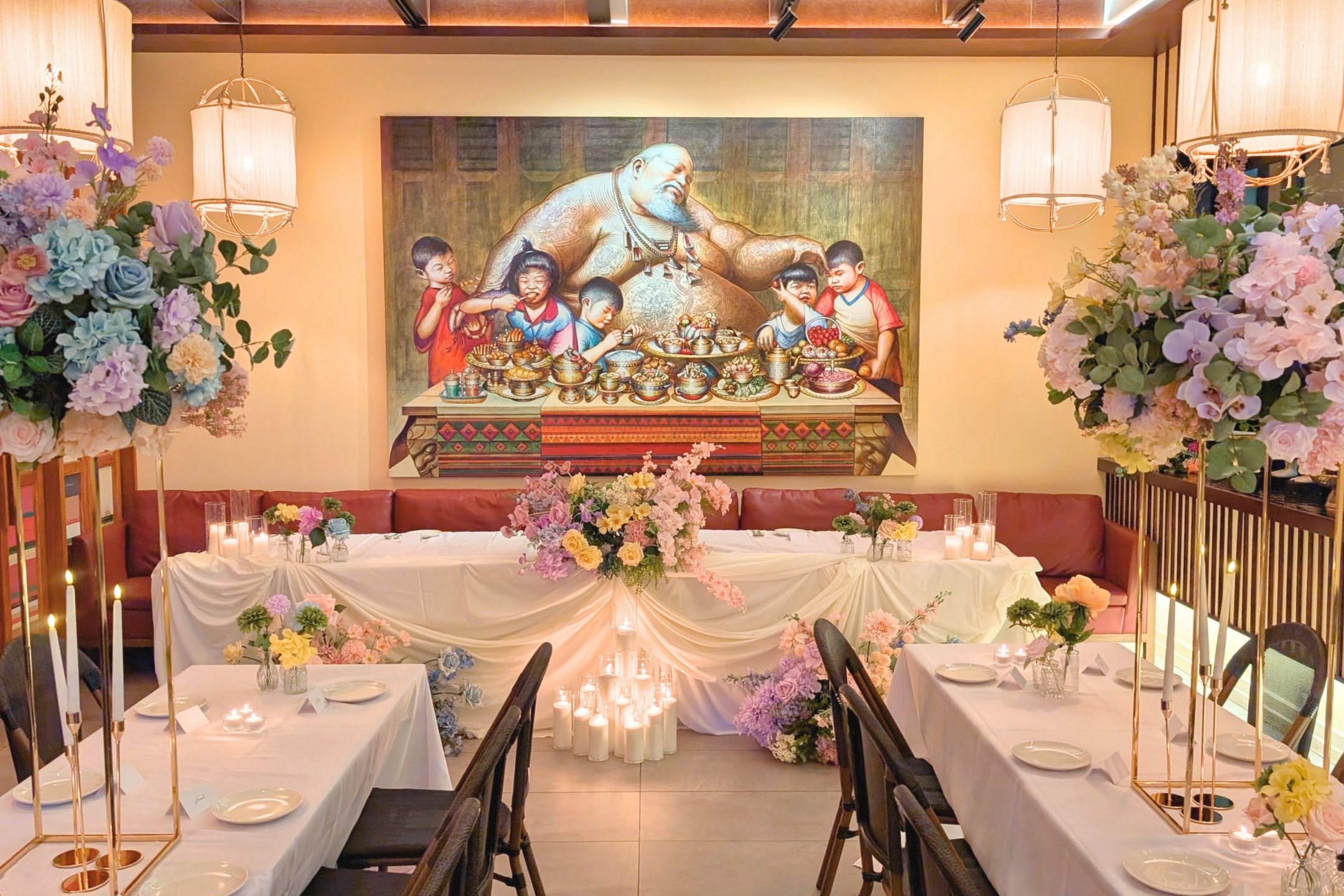 Elegant bridal table styling for Linh and Dineel’s Brisbane wedding reception featuring cream draping, pastel floral arrangements, candlelight and luxury wedding décor by Lush & Lavish Events