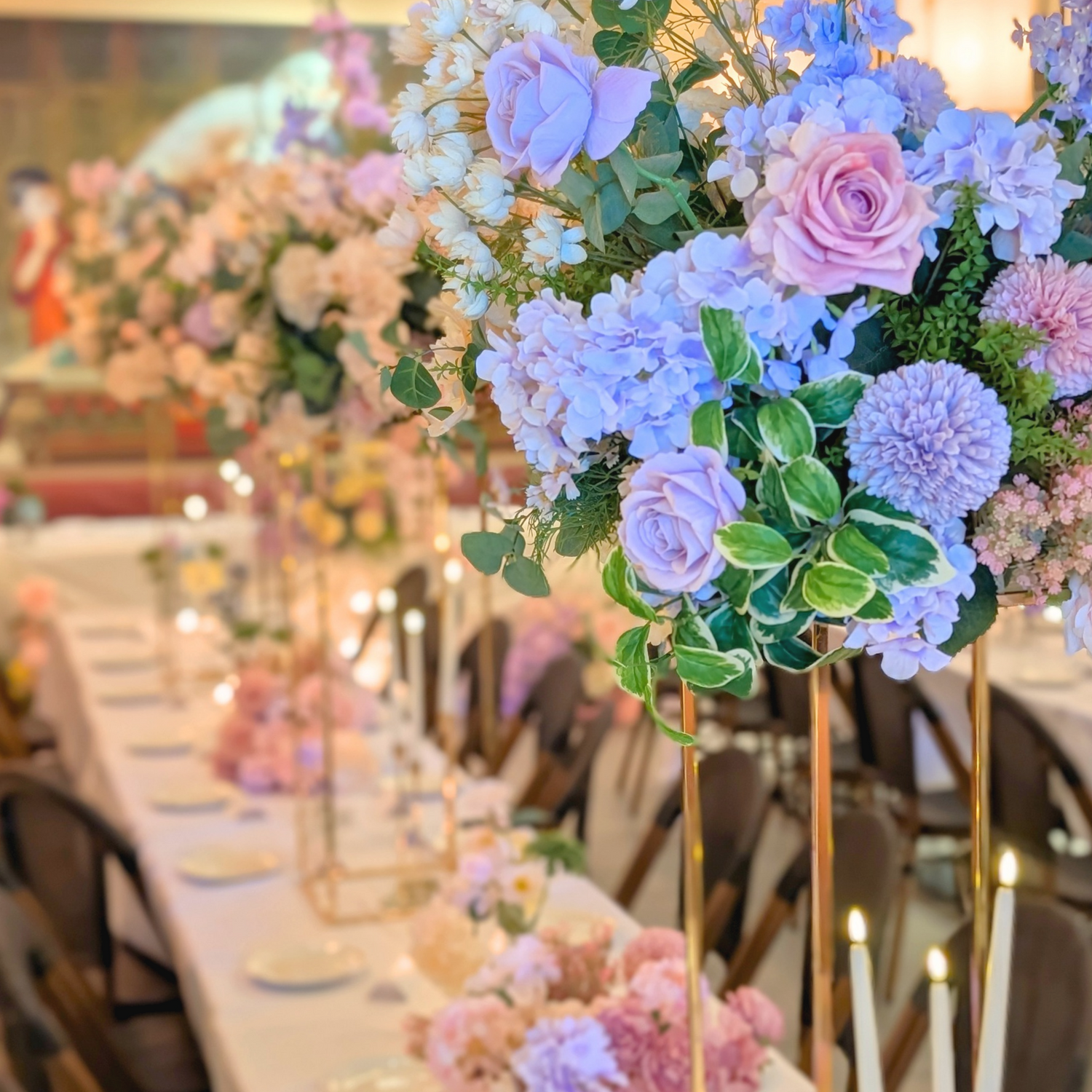 Luxury Brisbane wedding reception table styling for Linh and Dineel featuring pastel floral centrepieces, bud vases, taper candles and elegant dining details by Lush & Lavish Events