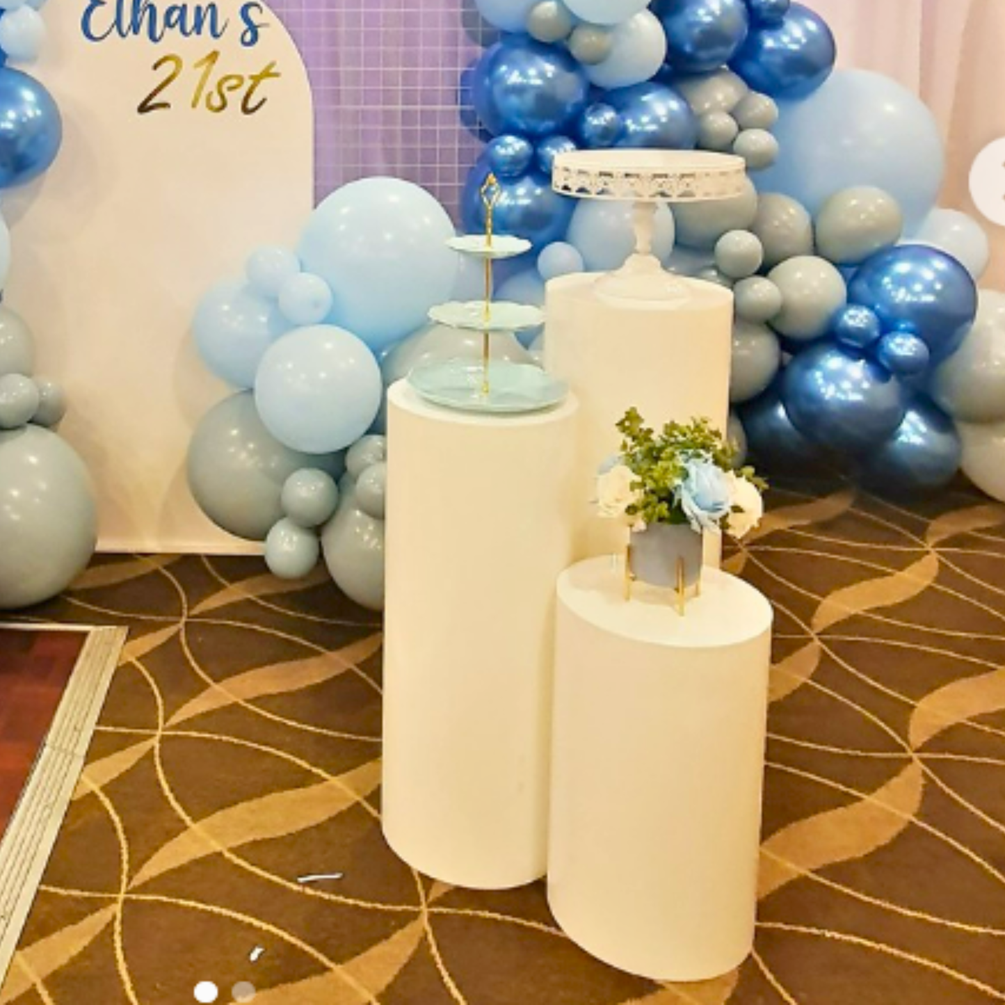 Decorative setup with balloons, candles, and flowers for a 21st birthday celebration. pink cupcake stand hire, blue cupcake stand hire, 3 tier cupcake stand hire, cupcake stand hire brisbane, cupcake stand hire gold coast, kids party cupcake stand, birthday party dessert stand, baby shower cupcake stand, party decor hire qld, dessert table styling hire, colourful cupcake stand, party prop hire brisbane, party hire gold coast, kids birthday party decor, cupcake display stand hire, themed party decor hire, ev